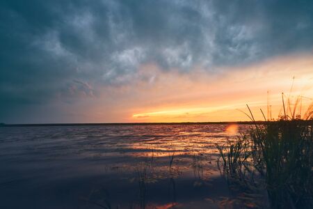A dramatic storm clouds at sunset. Amur region, russia