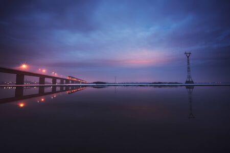 Bridge through Zeya river at night. Blagoveshchenskの写真素材