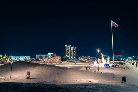 Illuminated Russian flag glowing in wintertime Blagoveshchensk, Russiaの写真素材