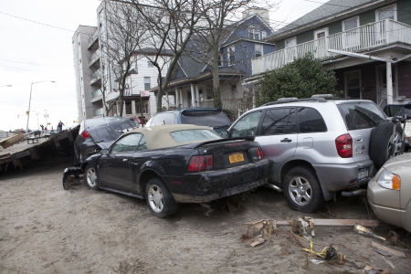 NEW YORK - November 1: Crashed cars after Hurricane Sandy  in the Far Rockaway area  on October 30, 2012 in New York City, NYのeditorial素材