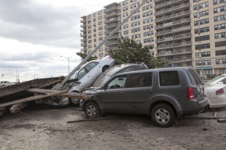 NEW YORK - November 1: Crashed cars after Hurricane Sandy  in the Far Rockaway area  on October 30,...