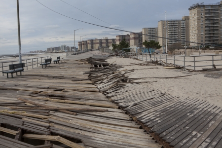 NEW YORK - November 1: Large section of the iconic boardwalk was washed away during Hurricane Sandy in Far Rockaway area October 29, 2012 in New York City, NYのeditorial素材