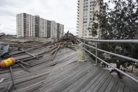 NEW YORK - November 1: Large section of the iconic boardwalk was washed away during Hurricane Sandy in Far Rockaway area October 29, 2012 in New York City, NYのeditorial素材