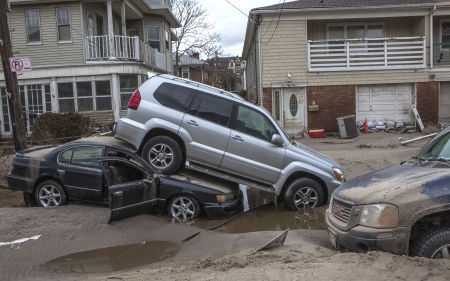NEW YORK - November 1: Crashed cars after Hurricane Sandy  in the Far Rockaway area  on October 30, 2012 in New York City, NYのeditorial素材