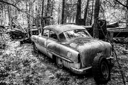 Kalispell - August 2:  Old cars and trucks in the  junk yards August 2, 2015 at Kalispel, MT.のeditorial素材