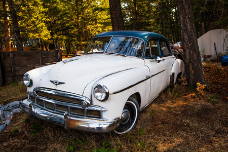 Kalispell - August 2:  Old cars and trucks in the  junk yards August 2, 2015 at Kalispel, MT.のeditorial素材
