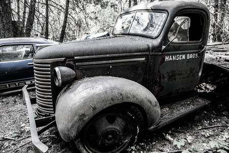 Kalispell - August 2:  Old cars and trucks in the  junk yards August 2, 2015 at Kalispel, MT.のeditorial素材