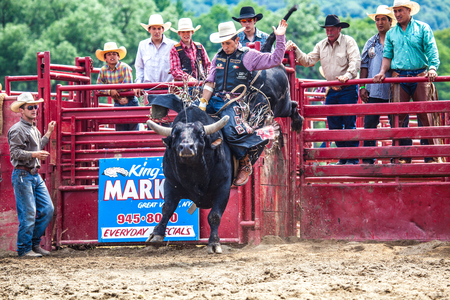 Ellicottville, New York - July 4 : Cowboy Participating Competition. Championship Rodeo, Located in the beautiful Enchanted Mountains that surround Ellicottville New York, USA on July 4 2011のeditorial素材