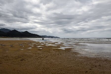 Cannon beach at low tide , Oregonの写真素材