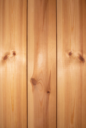 Wooden texture background, pine board, spruce table with knots. Vertical banner. Top view light wood textured surface with natural pattern. Timber backdrop. Rustic craft. Workbench, floor.の写真素材