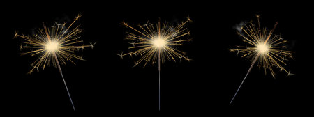 Burning sparklers realistic black background, bengal or Indian light set, Bright sparks. Firework...