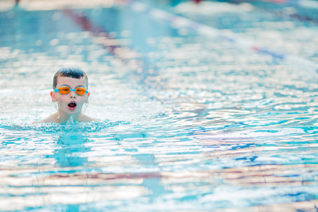 Boy swimming Freestyleの写真素材
