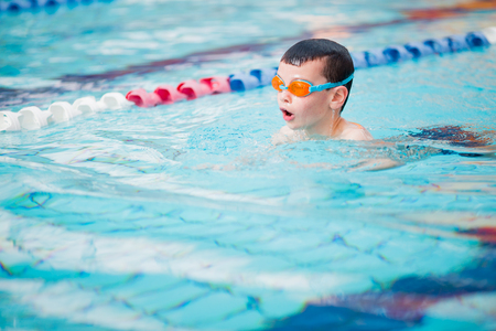 Boy swimming Freestyleの写真素材