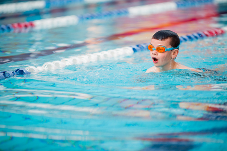 Boy swimming Freestyleの写真素材