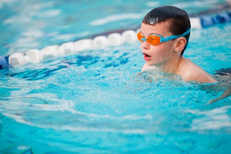 Boy swimming Freestyleの写真素材