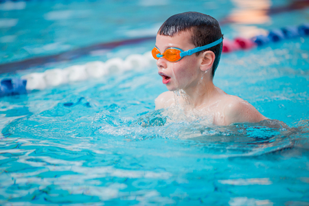 Boy swimming Freestyleの写真素材