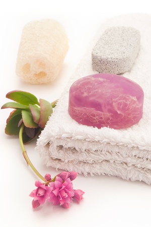 home spa with algae soap, loofa and towelの写真素材