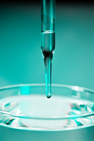 drop of liquid from medicine dropperの写真素材