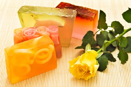 Handmade soaps and yellow roseの写真素材