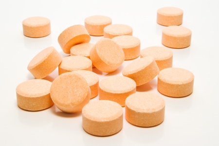 bunch of pills on white backgroundの写真素材