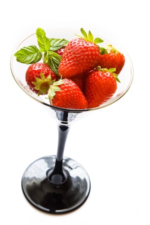 fresh strawberries in glass on white backgroundの写真素材
