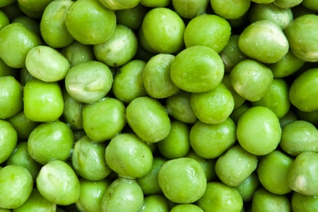 food background - green pea with water-dropsの写真素材