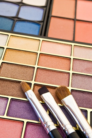 close-up of make-up colors and brushesの写真素材