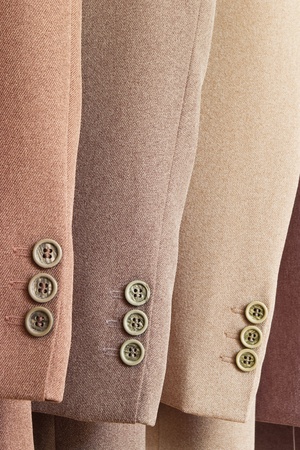 close-up of three men's suitsの写真素材