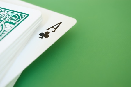 close-up of playing cards on green backgroundのeditorial素材