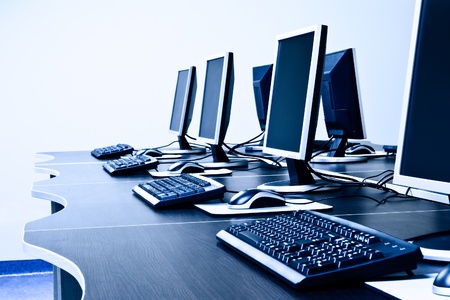 workplace room with computers in rowの写真素材