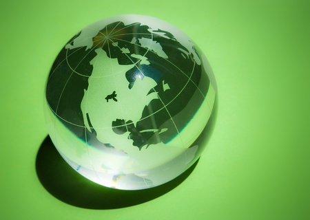green globe with north america over green backgroundの写真素材