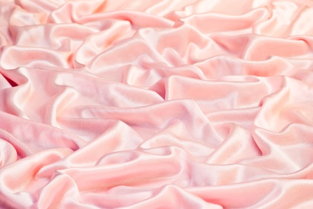 creamy silky pink fabric backgroundの写真素材