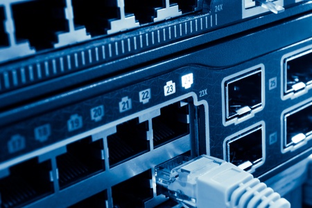 network cable and hub in data centerの写真素材