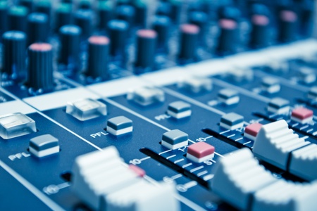audio mixer with shallow depth of field - blue toned
