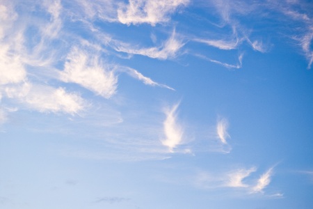 fluffy clouds on blue sky