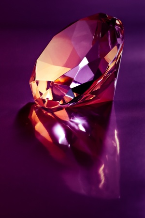 shiny diamond on purple lightの写真素材
