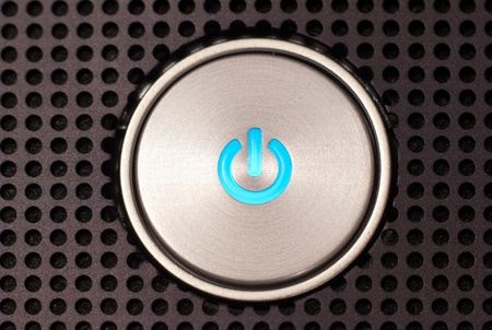 power button on dotted surfaceの写真素材