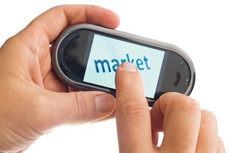 market on smartphone in hand on white backgroundの写真素材