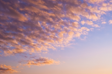 dreamy colorful evening sky with cloudsの写真素材