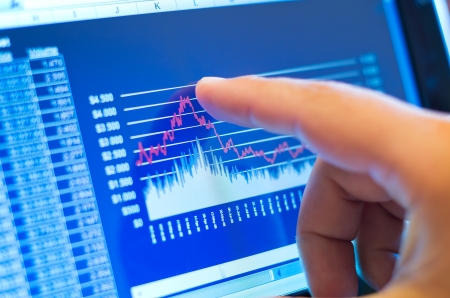 business chart on a touch screen tablet-pcの写真素材