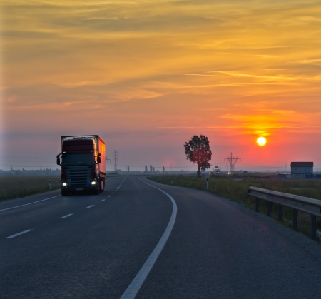 long exposure of truck at sunsetの写真素材