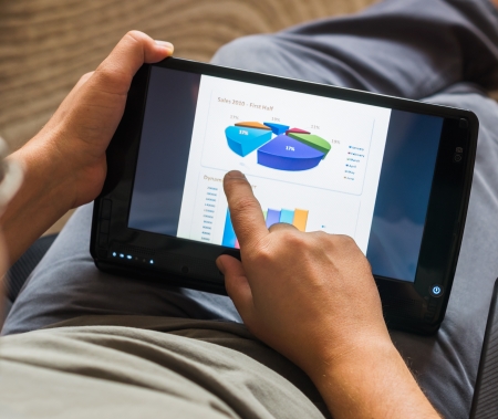 sales chart on tablet-pc with touchscreenの写真素材
