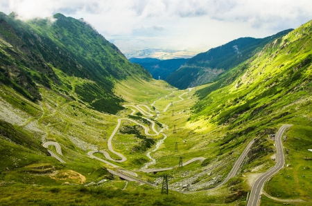 road on green mountain valley in summerの写真素材