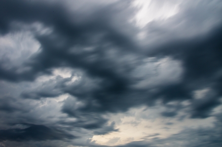 moving dark storm clouds before rainの写真素材