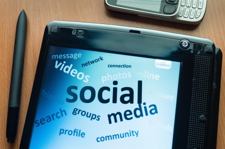 social media and connected words on tablet-pc screenの写真素材