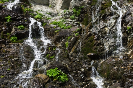 beautifull waterfall closeup in the middle of the dayの写真素材