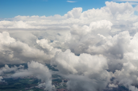 aerial view through lot of cloudsの写真素材