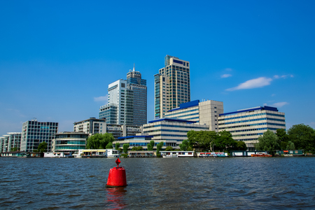 Office towers on the Amstel river in Amsterdamのeditorial素材
