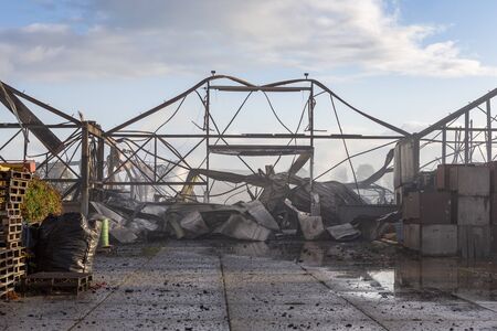 The remains of a burned warehouse in Voorhout, the Netherlands. The day after.の写真素材