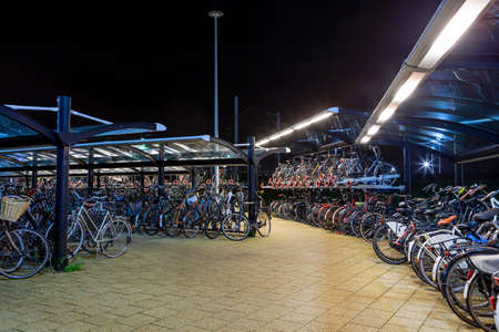 Full bicycle shed at Sassenheim train station in the Netherlands.のeditorial素材